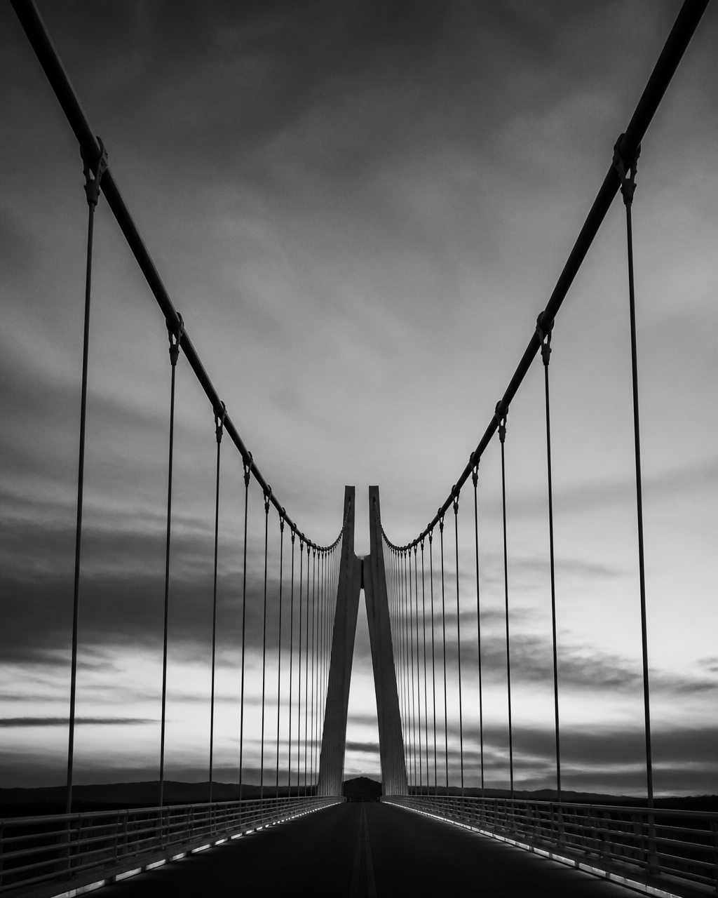 Architectural bridge perspective in cinematic dusk light